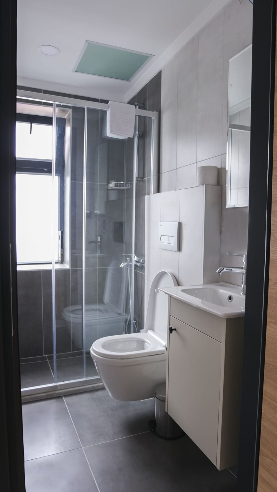 Shower, free toiletries, hair dryer, slippers