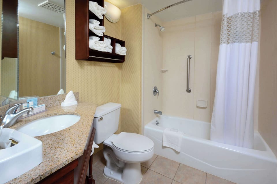 Eco-friendly toiletries, hair dryer, towels, soap