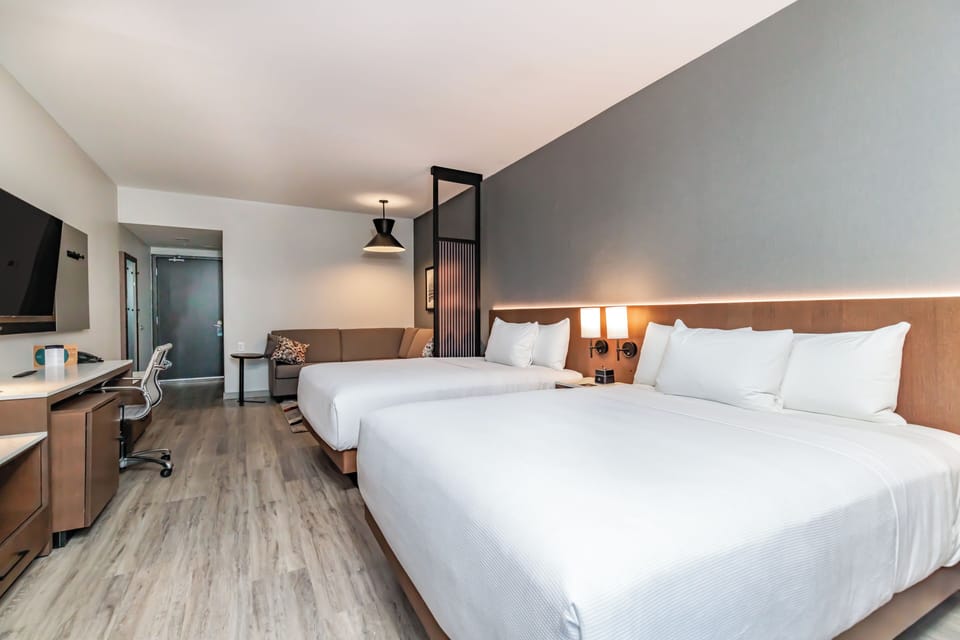 Room, Multiple Beds | In-room safe, desk, iron/ironing board, free WiFi