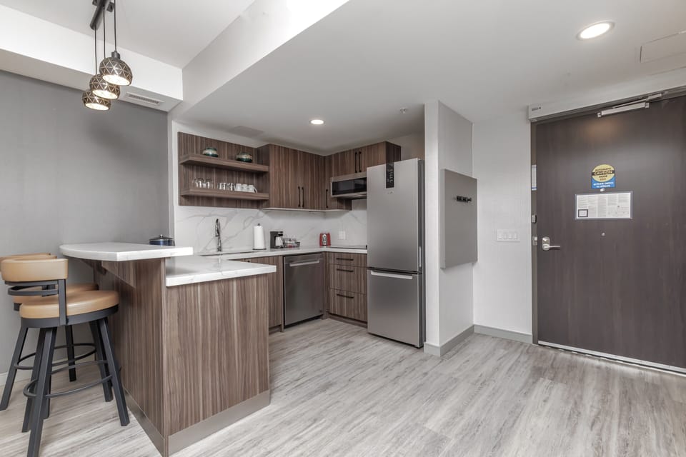 Room, 1 King Bed with Sofa bed (Suite) | Private kitchen | Coffee/tea maker