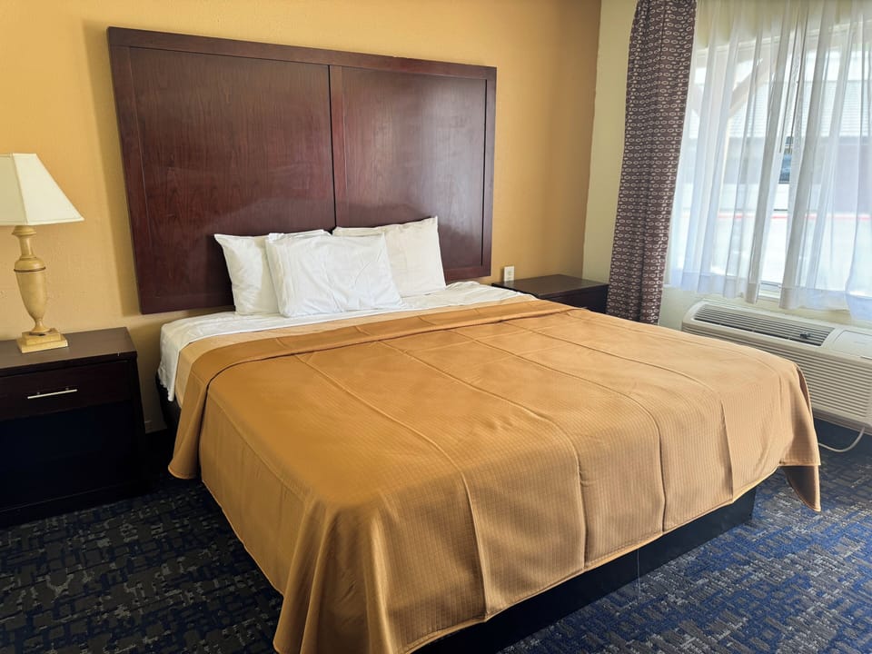 Blackout drapes, iron/ironing board, WiFi (free), bed sheets
