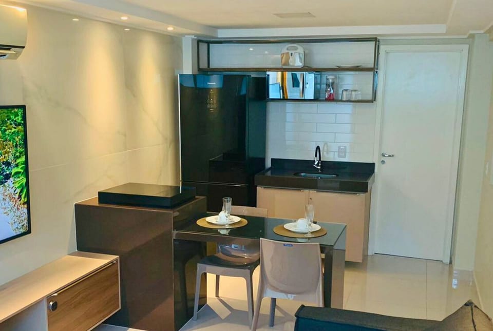 Elite Apartment | Living area | 60-inch flat-screen TV with cable channels, TV
