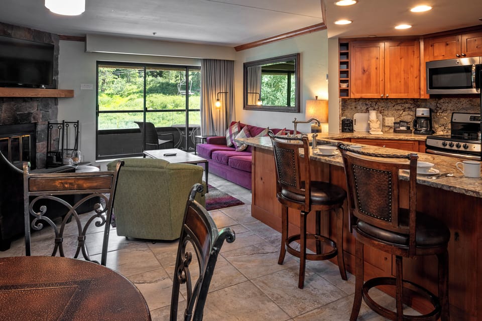 Suite, 1 Bedroom, Mountainside | Living area | 36-inch flat-screen TV with satellite channels, TV
