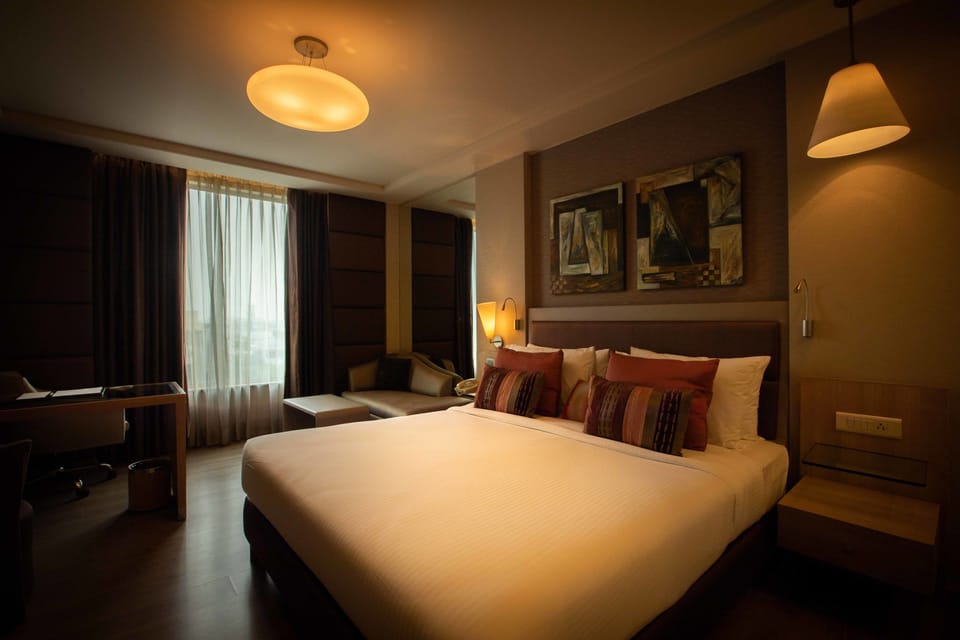 Deluxe Quadruple Room | Premium bedding, minibar, in-room safe, desk