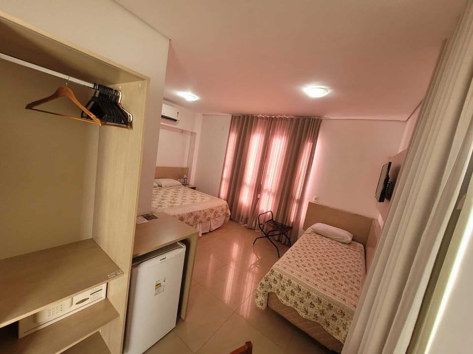 Standard Double or Twin Room | Minibar, in-room safe, desk, laptop workspace