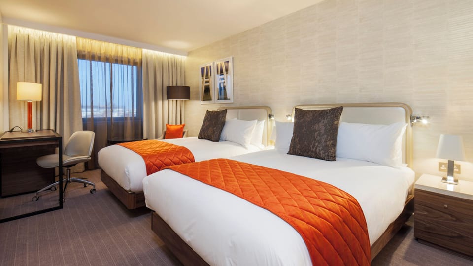 In-room safe, desk, iron/ironing board, free cribs/infant beds
