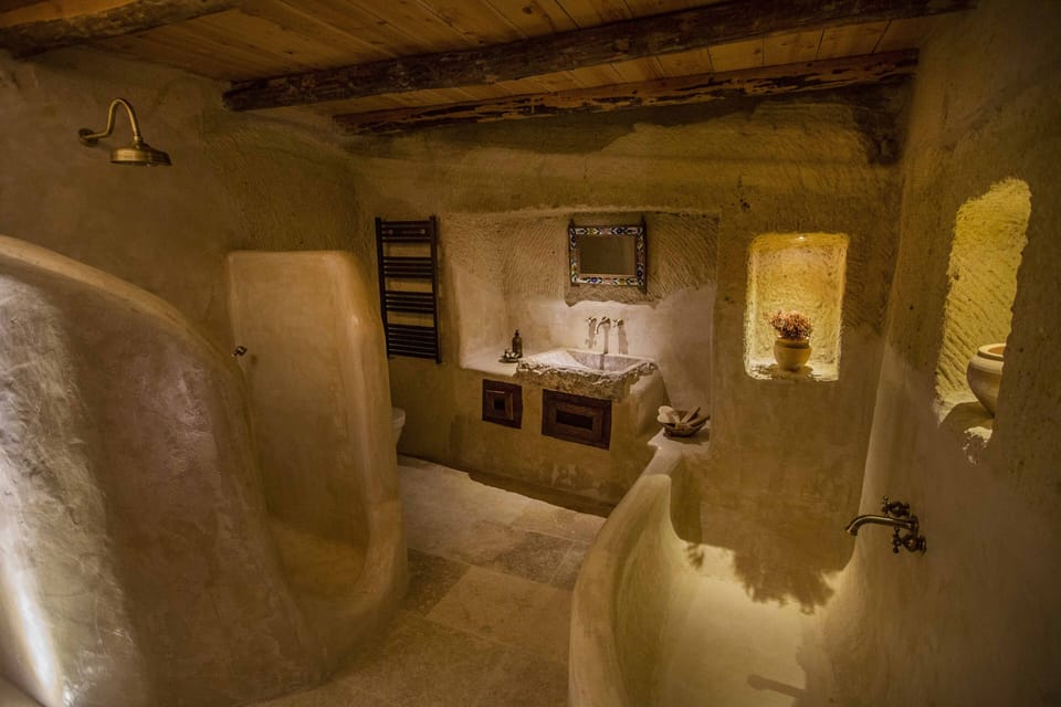 Deluxe Suite | Bathroom | Designer toiletries, hair dryer, slippers, bidet