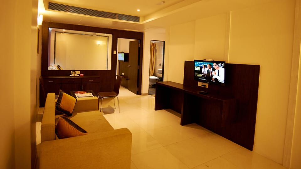 Deluxe Family Suite Non AC | In-room safe, desk, free WiFi, bed sheets