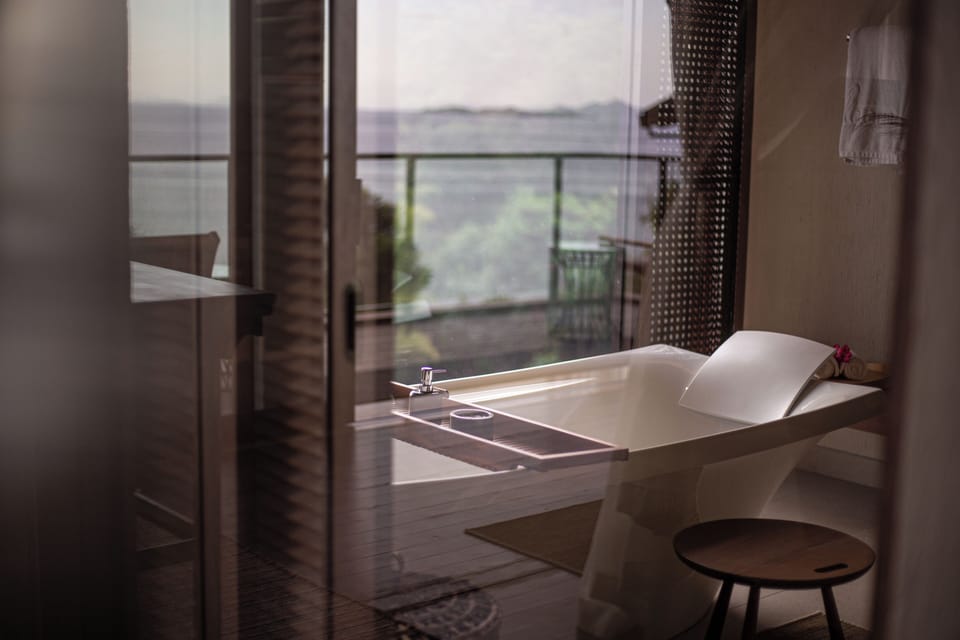 Hanging Pool Residence | Bathroom | Separate tub and shower, eco-friendly toiletries, hair dryer, bathrobes