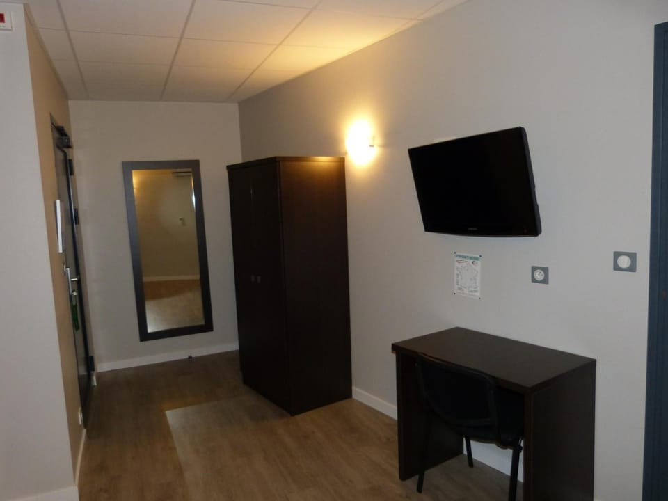 Desk, blackout drapes, soundproofing, iron/ironing board