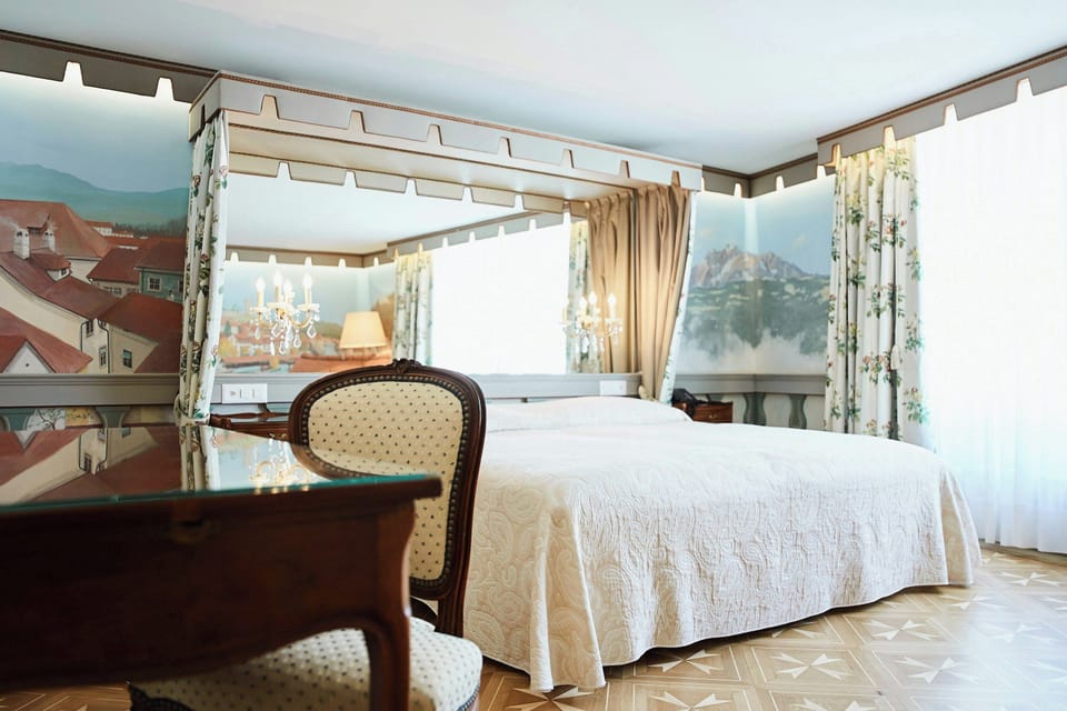 Hypo-allergenic bedding, down comforters, minibar, in-room safe