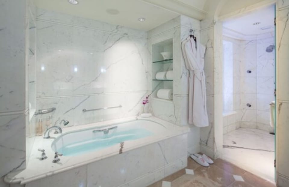 Separate tub and shower, free toiletries, bathrobes, slippers
