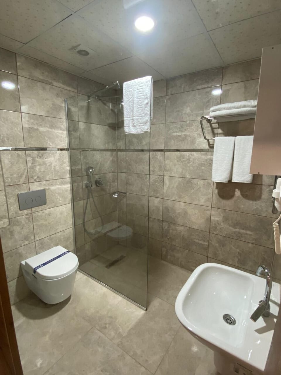 Shower, rainfall showerhead, hair dryer, bathrobes