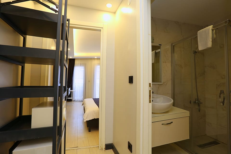 Deluxe Double Room, Balcony, Sea View | In-room safe, blackout drapes, soundproofing, free WiFi