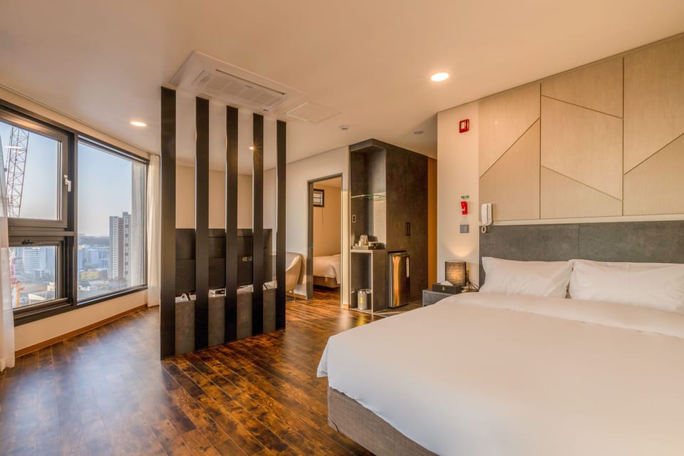 Premium bedding, down comforters, blackout drapes, soundproofing