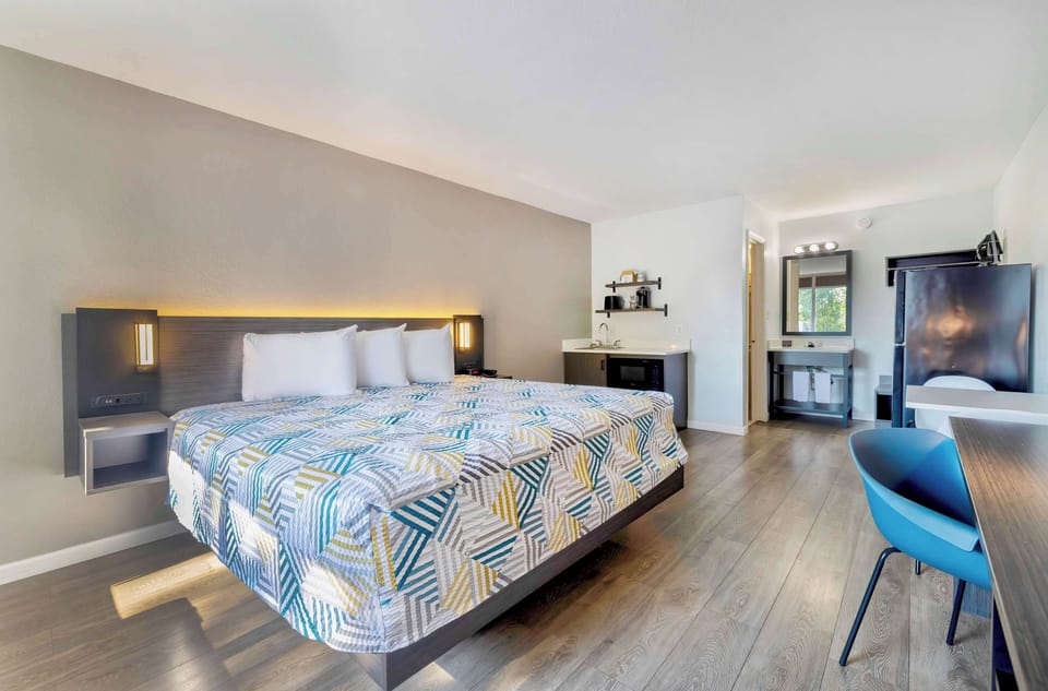 Individually furnished, desk, laptop workspace, blackout drapes