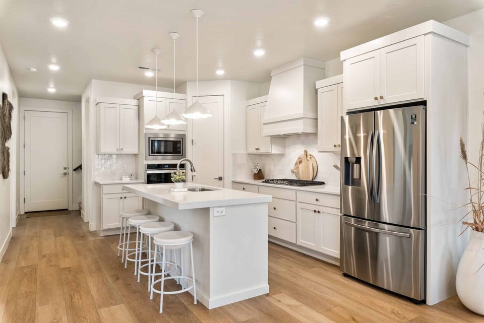 Townhome, 5 Bedrooms | Private kitchen | Coffee/tea maker, fridge, oven, toaster