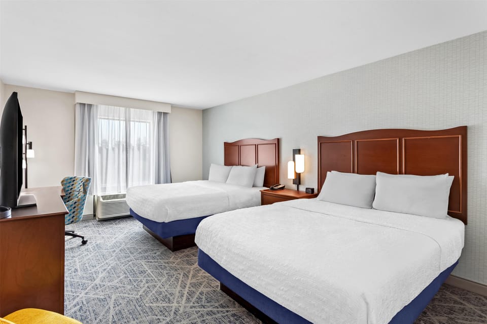 Room, 2 Queen Beds | In-room safe, desk, iron/ironing board, WiFi (free)