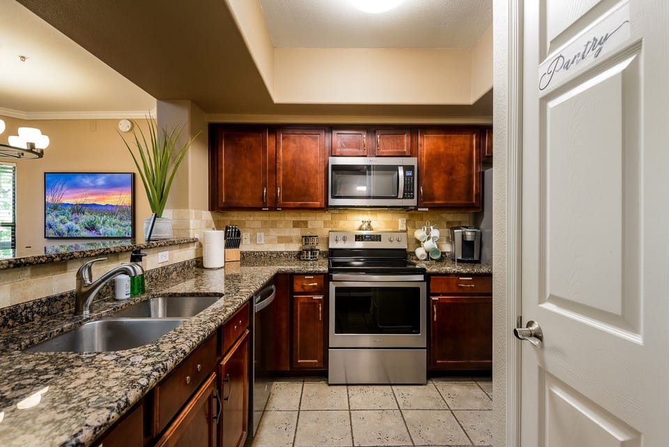 Condo, 2 Bedrooms | Private kitchen | Fridge, oven, coffee/tea maker, toaster