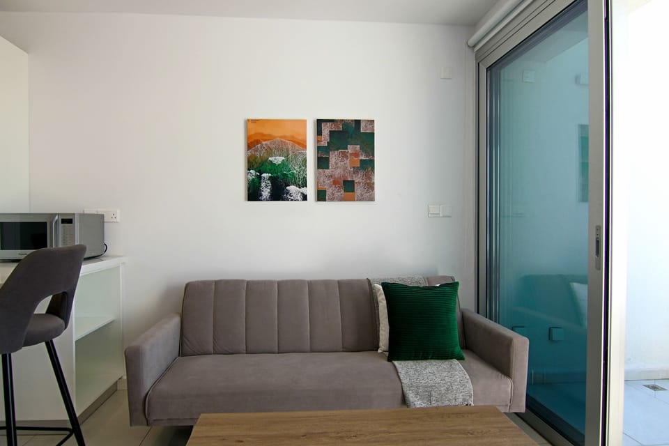 Executive Apartment | Living area | TV