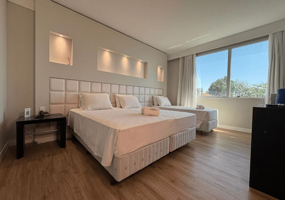 Deluxe Double or Twin Room | In-room safe, desk, laptop workspace, blackout drapes