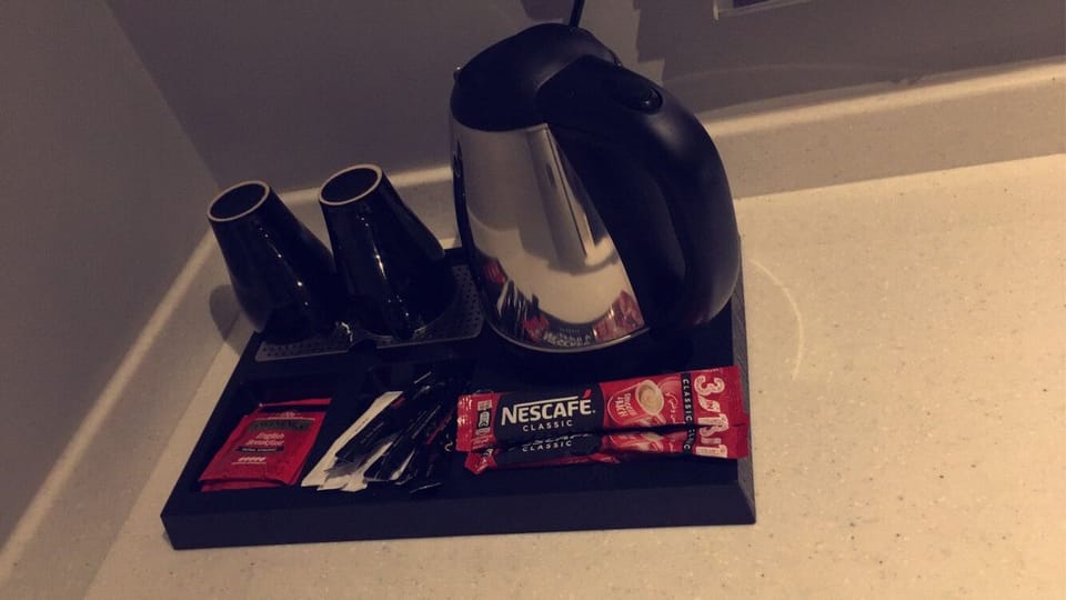 Basic Suite | Private kitchen | Mini-fridge, microwave, coffee/tea maker, electric kettle