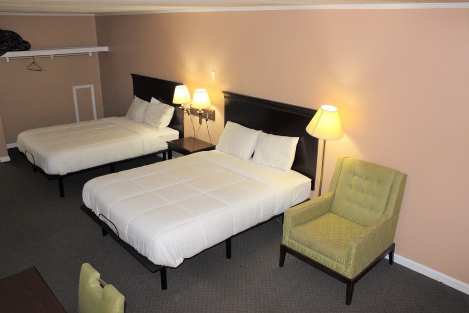 Business Quadruple Room | Premium bedding, pillowtop beds, individually decorated
