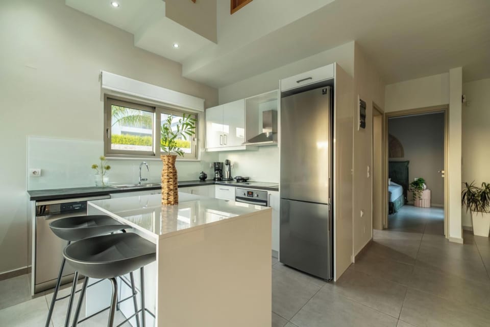 Villa | Private kitchen | Full-size fridge, oven, stovetop, dishwasher