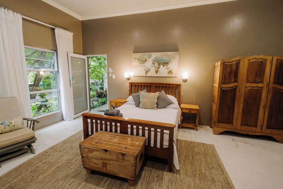 Family Room, Garden View | In-room safe, individually decorated, individually furnished, desk