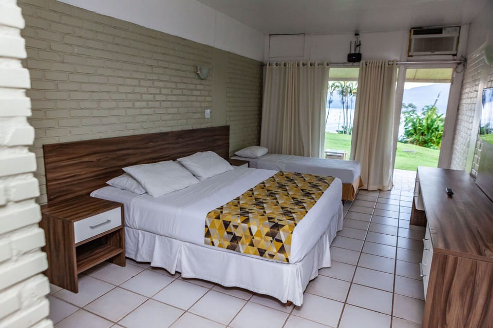 Luxury Suite, Multiple Beds, Garden Area | Minibar, in-room safe, blackout drapes, bed sheets