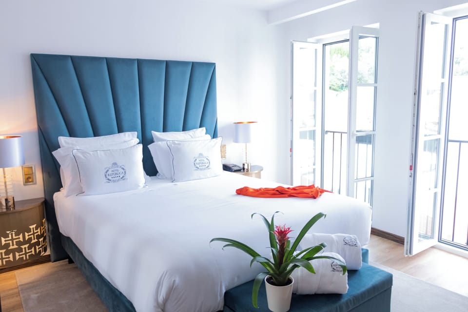 Deluxe Double Room | Minibar, in-room safe, desk, blackout drapes