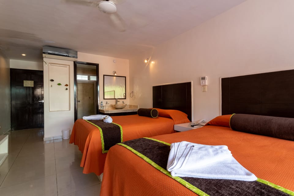 Basic Room, 2 Double Beds | In-room safe, free WiFi, bed sheets
