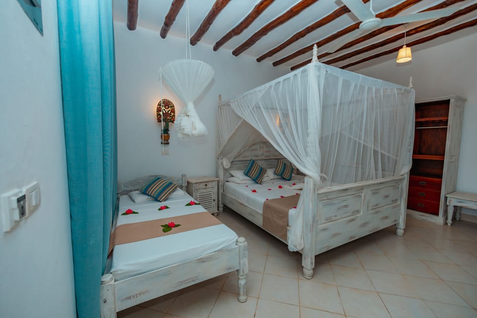 Classic Triple Room | In-room safe, desk, blackout drapes, travel crib