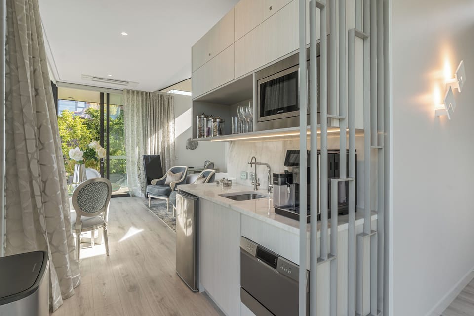 Villa Surrender | Private kitchen | Coffee/tea maker, mini-fridge, microwave, dishwasher