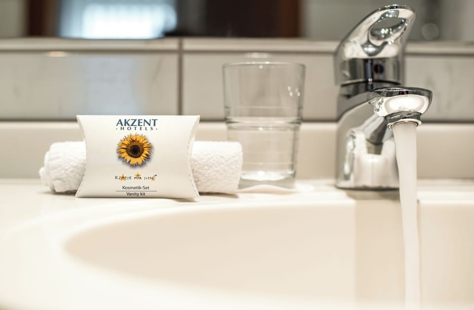Deep soaking tub, rainfall showerhead, free toiletries, hair dryer