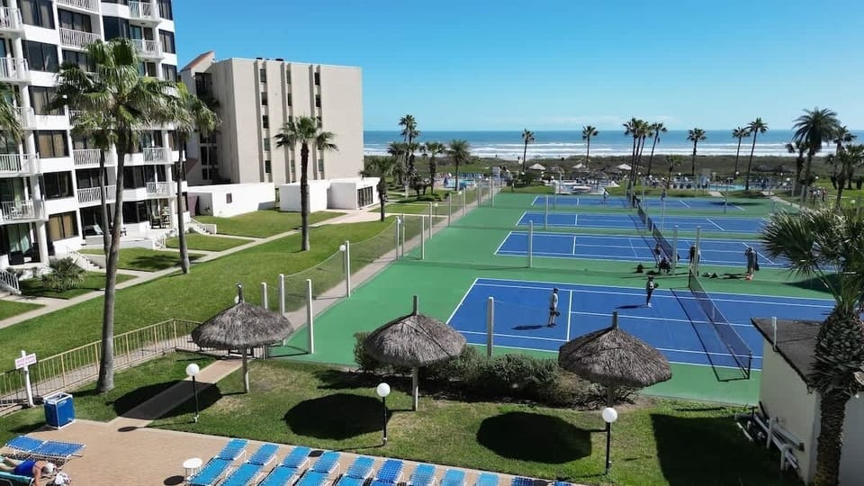 Beachfront Resort * Heated Pool * Sleeps Heaps (Saida Royale 9039) by RedAwning House in South Padre Island