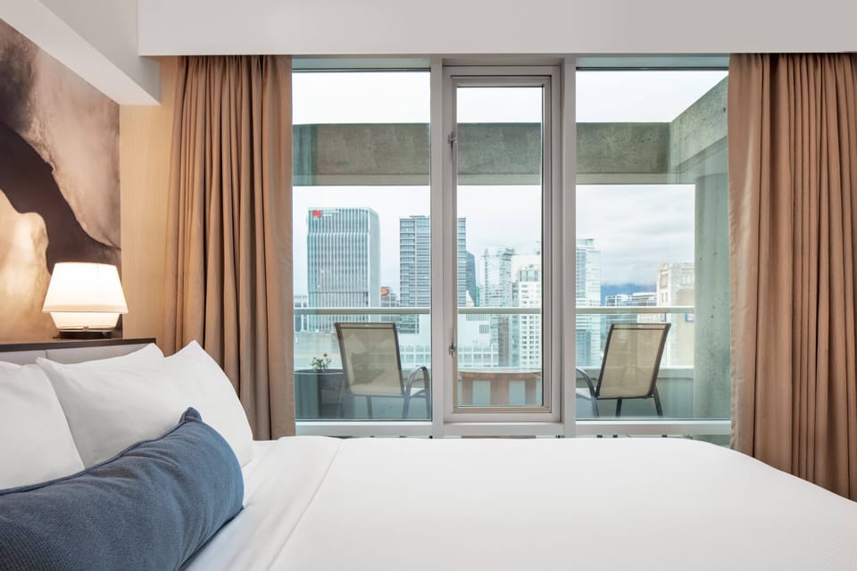 Suite, 1 King Bed with Sofa bed, Balcony, City View | 1 bedroom, premium bedding, pillowtop beds, in-room safe