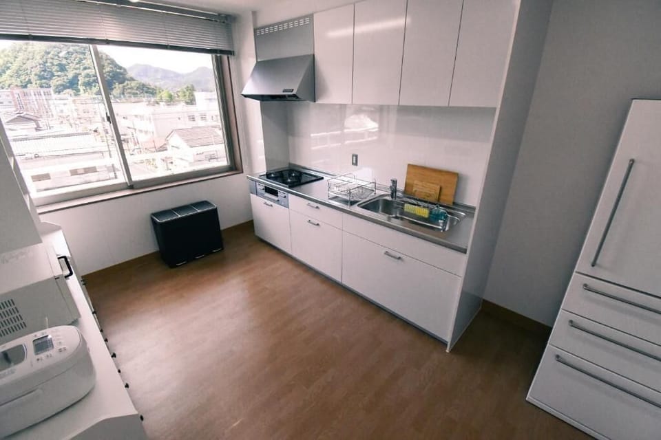 Full-size fridge, microwave, stovetop, toaster