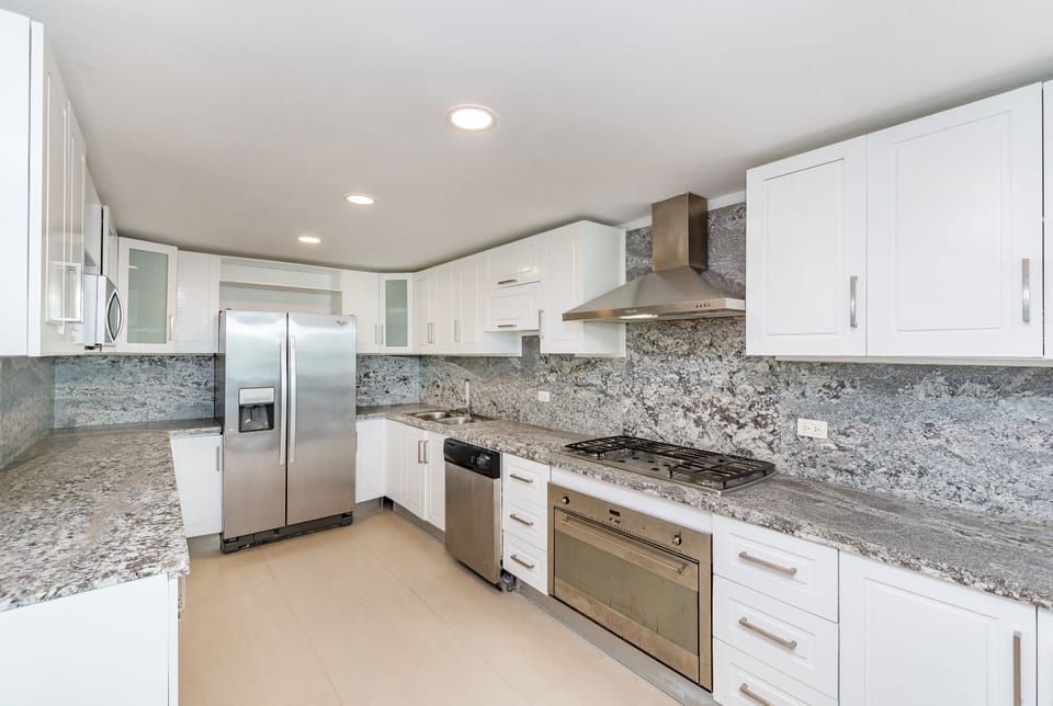Premium Villa | Private kitchen | Coffee/tea maker, full-size fridge, microwave, oven