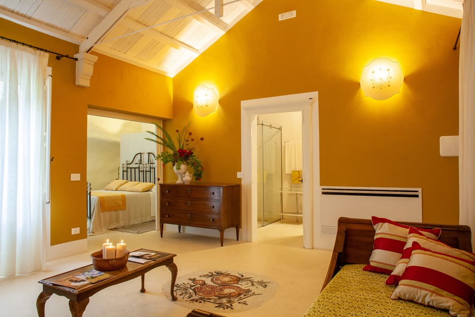 Superior Suite | Minibar, in-room safe, soundproofing, iron/ironing board
