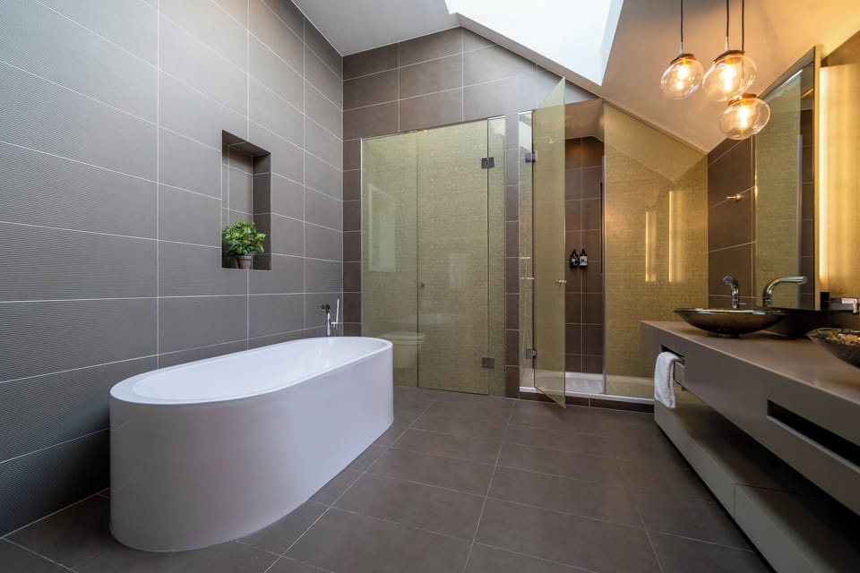 Designer toiletries, hair dryer, towels, soap