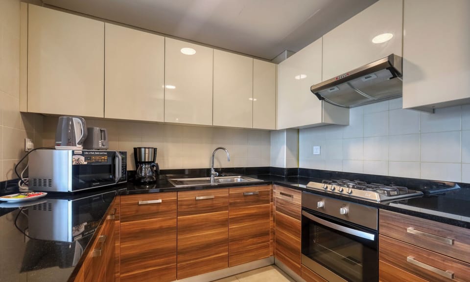 Luxury Apartment | Private kitchen | Full-size fridge, microwave, oven, coffee/tea maker