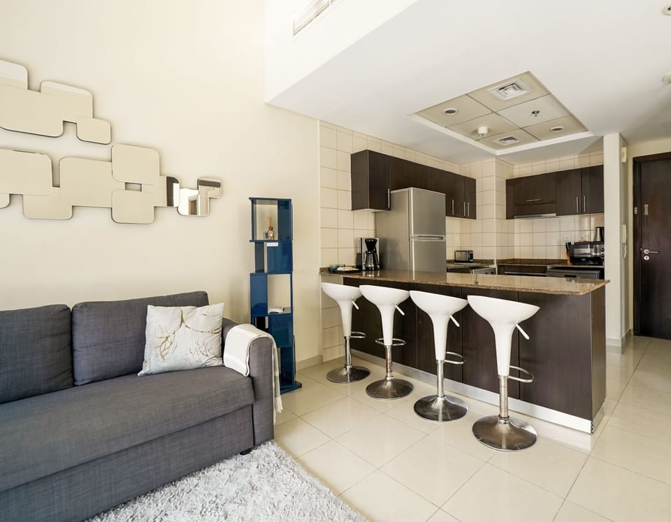 Luxury Apartment | Living area | 43-inch Smart TV with cable channels, TV
