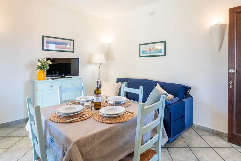 Classic Condo | Living area | 32-inch flat-screen TV with satellite channels, TV