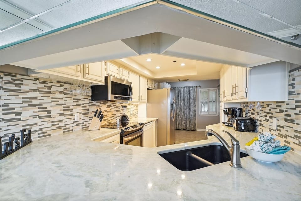 Condo, 2 Bedrooms | Private kitchen | Coffee/tea maker, fridge, oven, stovetop