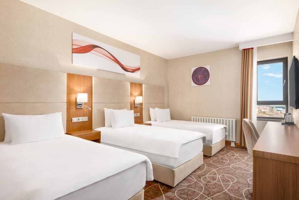 Premium bedding, minibar, desk, laptop workspace