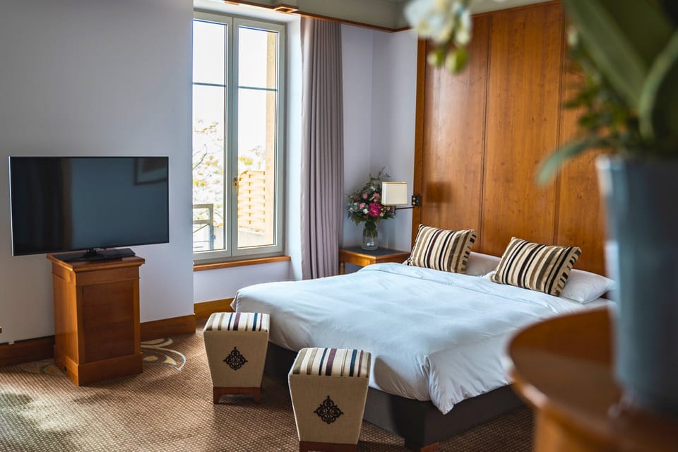 Premium bedding, down comforters, in-room safe, desk