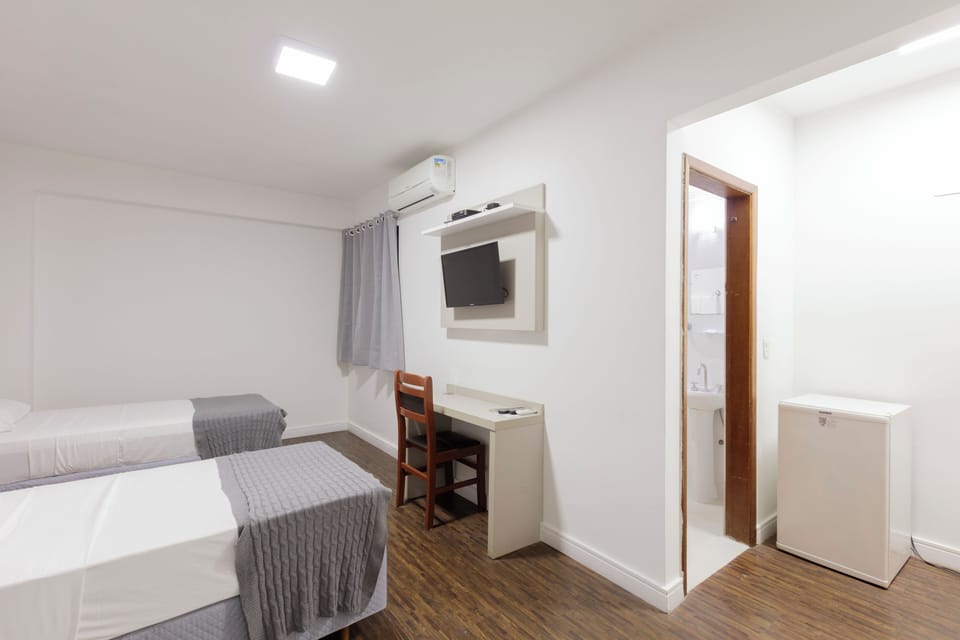 Twin Room | Minibar, desk, blackout drapes, free WiFi