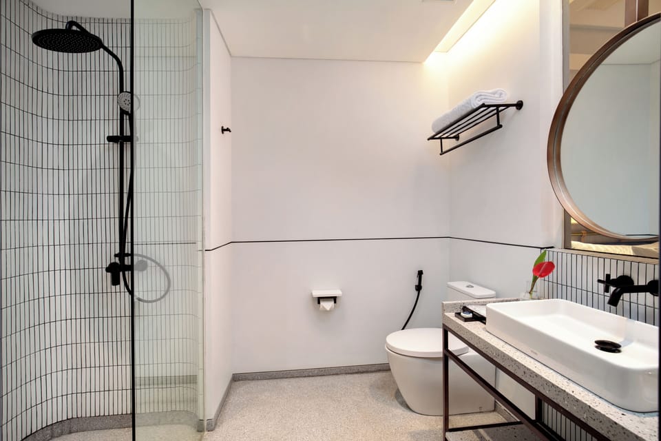 Shower, rainfall showerhead, towels
