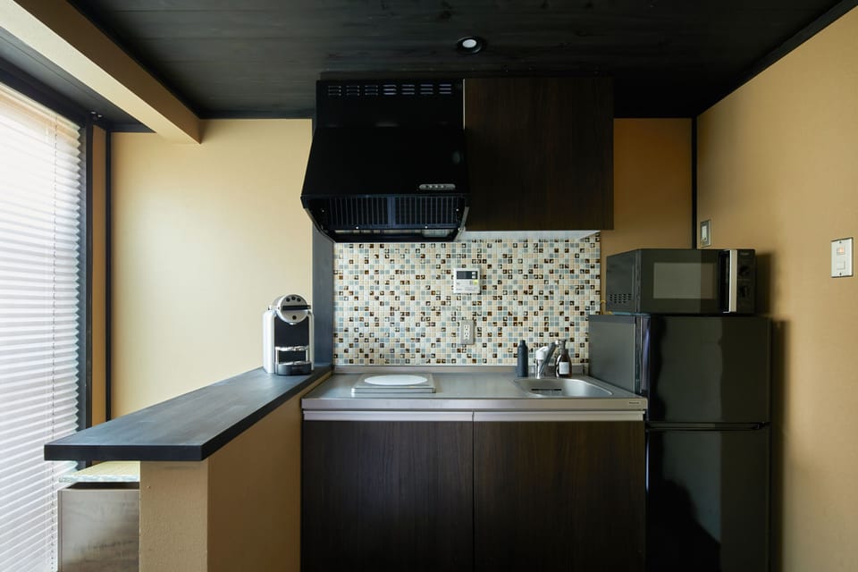 Mini-fridge, microwave, stovetop, coffee/tea maker